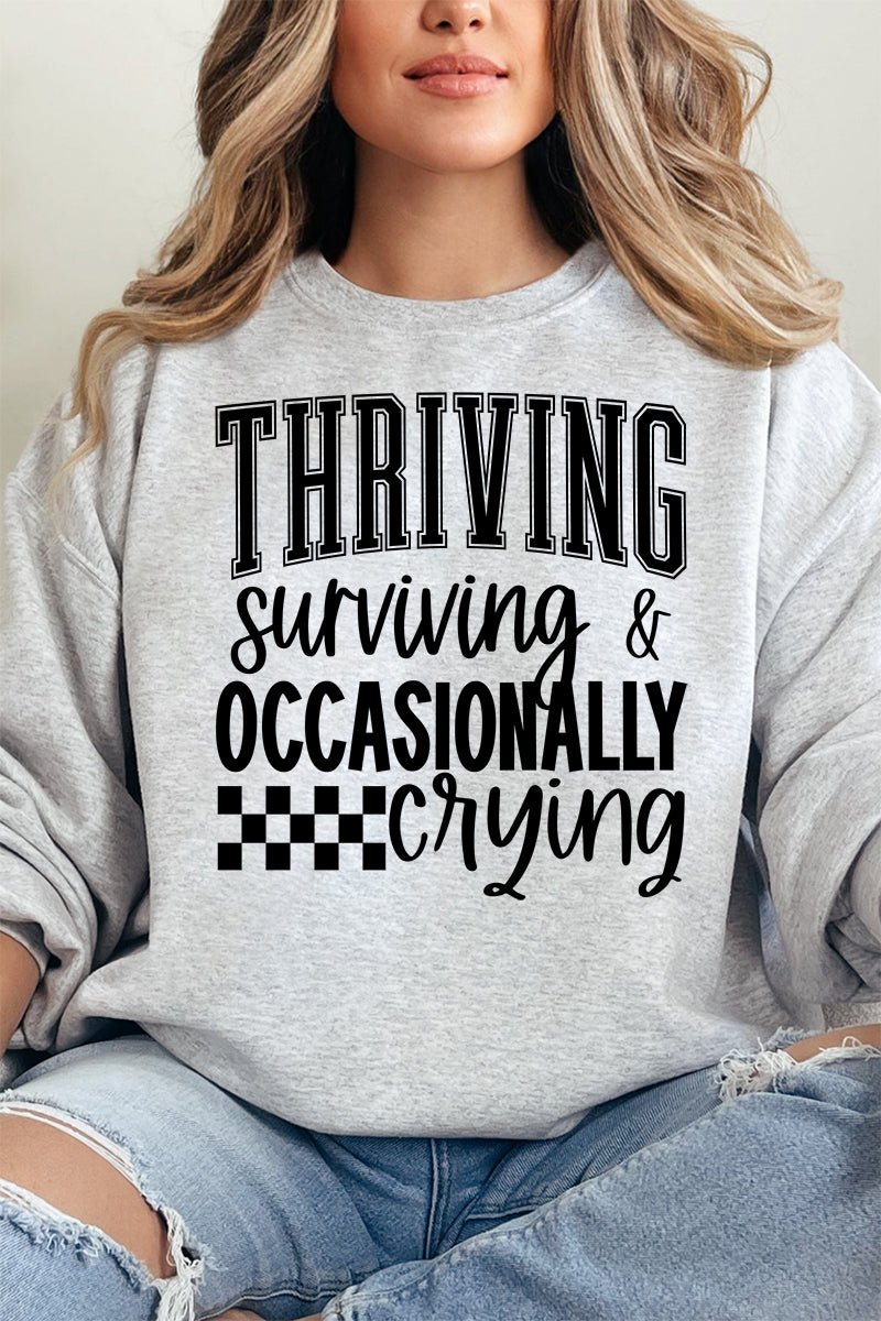 Thriving, Surviving, Crying Unisex NuBlend Crew Sweatshirt - Wholesale Accessory Market