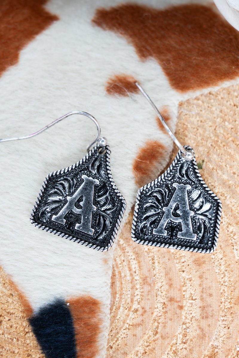 TIPI Cattle Tag 'A' Silvertone Earrings - Wholesale Accessory Market