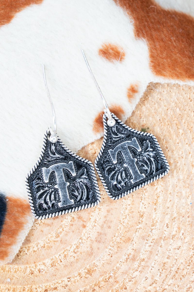TIPI Cattle Tag 'T' Silvertone Earrings - Wholesale Accessory Market