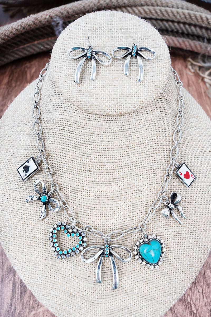 Turquoise Heartbreaker's Hand Silvertone Charm Necklace and Earring Set - Wholesale Accessory Market