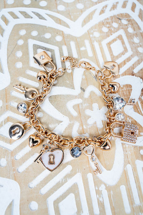 Under Lock & Key Crystal Goldtone Charm Bracelet - Wholesale Accessory Market