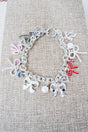 Couture Ties Silvertone Charm Toggle Bracelet - Wholesale Accessory Market