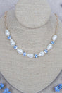 Crystal Avenue Blue Sunday Bloom Goldtone Necklace - Wholesale Accessory Market