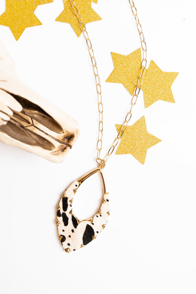 Crystal Avenue Marylee Black Cow Pendant Goldtone Necklace - Wholesale Accessory Market