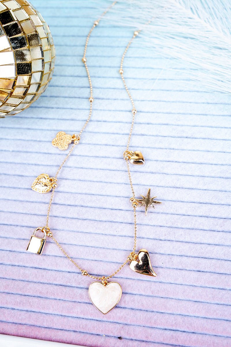 Crystal Avenue White Paris Stroll Goldtone Charm Necklace - Wholesale Accessory Market