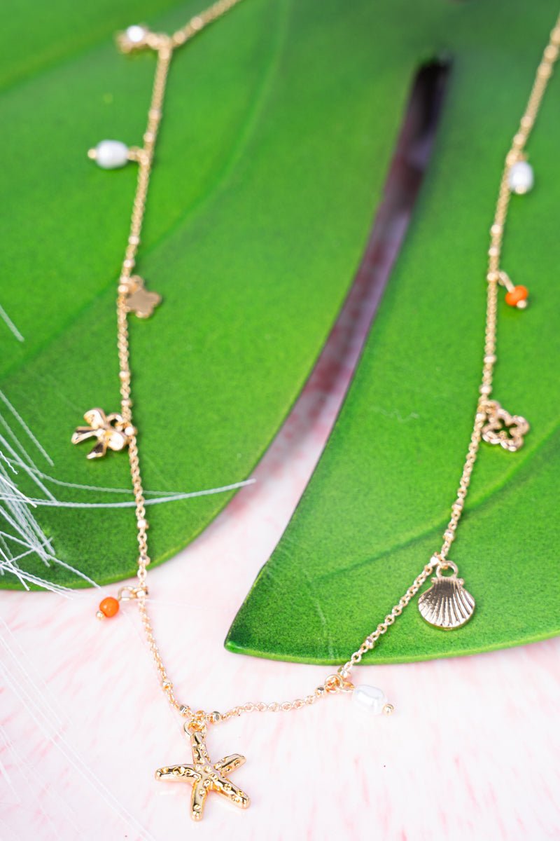Crystal Avenue Coastal Vibes Goldtone Charm Necklace - Wholesale Accessory Market
