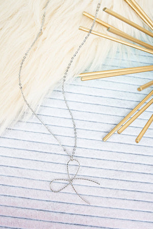 Crystal Avenue Silvertone Knot Your Average Bow Necklace - Wholesale Accessory Market