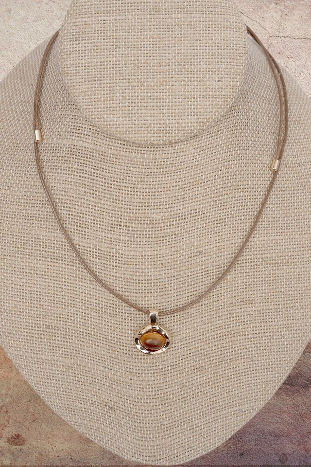Crystal Avenue Catch Your Eye Brown & Goldtone Cord Necklace - Wholesale Accessory Market
