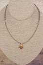 Crystal Avenue Catch Your Eye Brown & Goldtone Cord Necklace - Wholesale Accessory Market