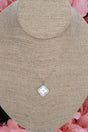 Crystal Avenue Cubic Zirconia Clover Serenity Silvertone Necklace - Wholesale Accessory Market