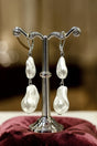 Crystal Avenue The Pearl Edit Silvertone Huggie Hoop Earrings - Wholesale Accessory Market