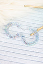 Crystal Avenue Iridescent Aqua Acrylic Hoop Earrings - Wholesale Accessory Market