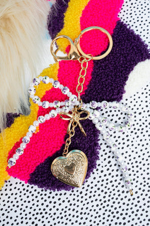 Crystal Avenue Openhearted Purple Flower Beaded Bow Keychain - Wholesale Accessory Market