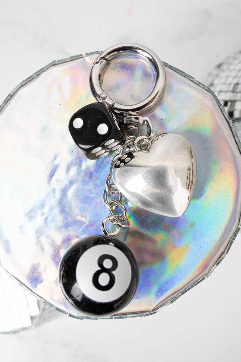Crystal Avenue Love's Gamble Silvertone Bag Charm - Wholesale Accessory Market