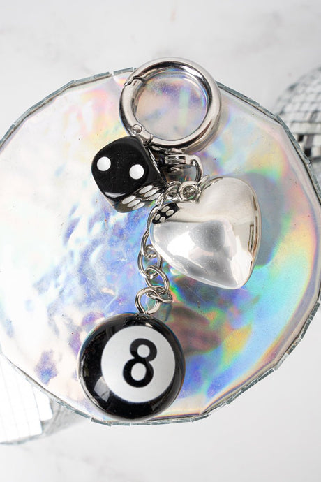 Crystal Avenue Love's Gamble Silvertone Bag Charm - Wholesale Accessory Market