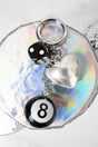 Crystal Avenue Love's Gamble Silvertone Bag Charm - Wholesale Accessory Market