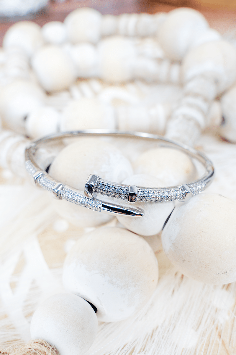 Crystal Avenue Cubic Zirconia Refined Edge Silvertone Nail Bangle - Wholesale Accessory Market