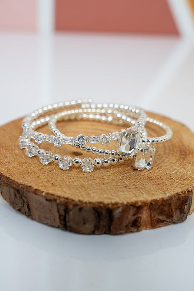 Crystal Avenue Cubic Zirconia Downtown Dazzle Silvertone Coiled Bracelet Set - Wholesale Accessory Market