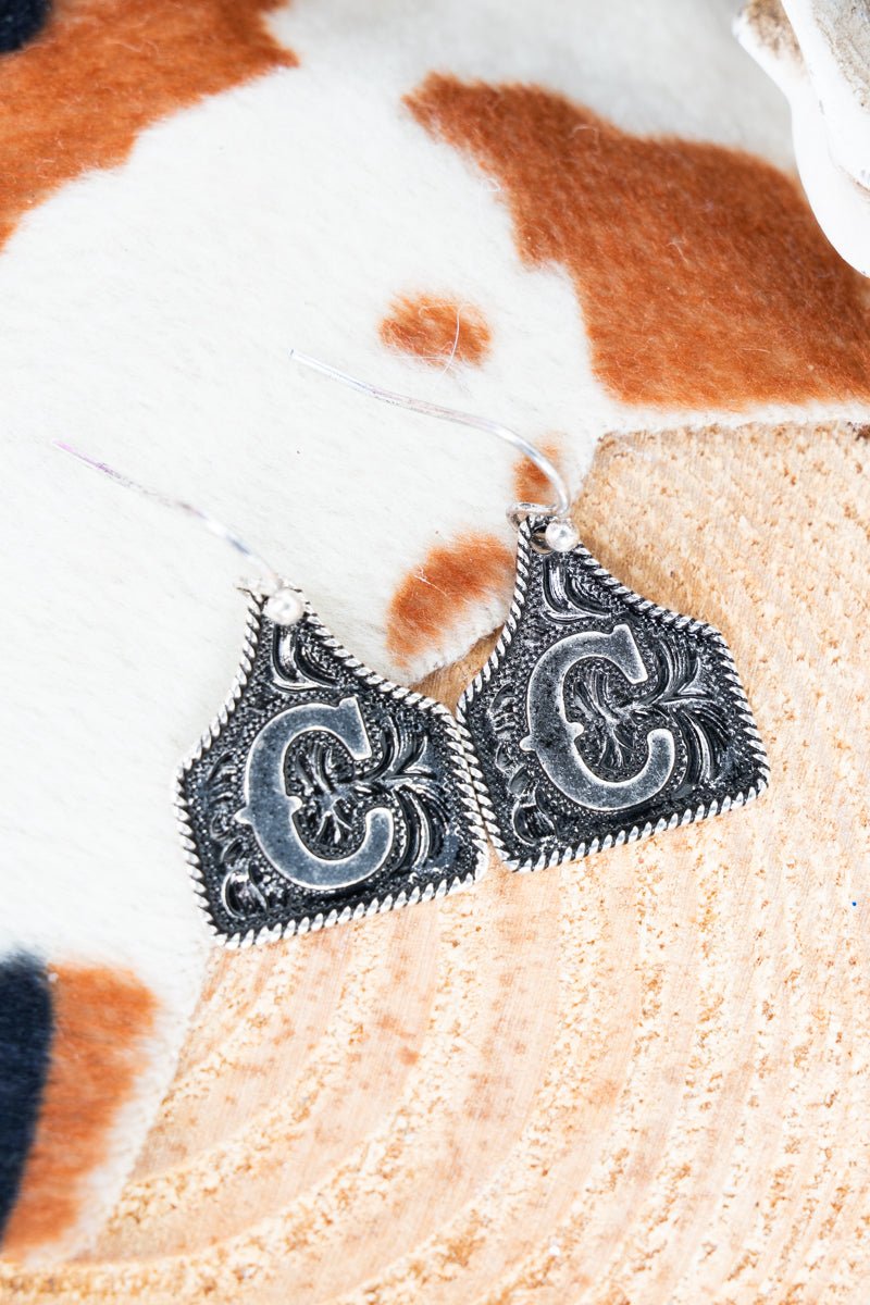 TIPI Cattle Tag 'C' Silvertone Earrings - Wholesale Accessory Market