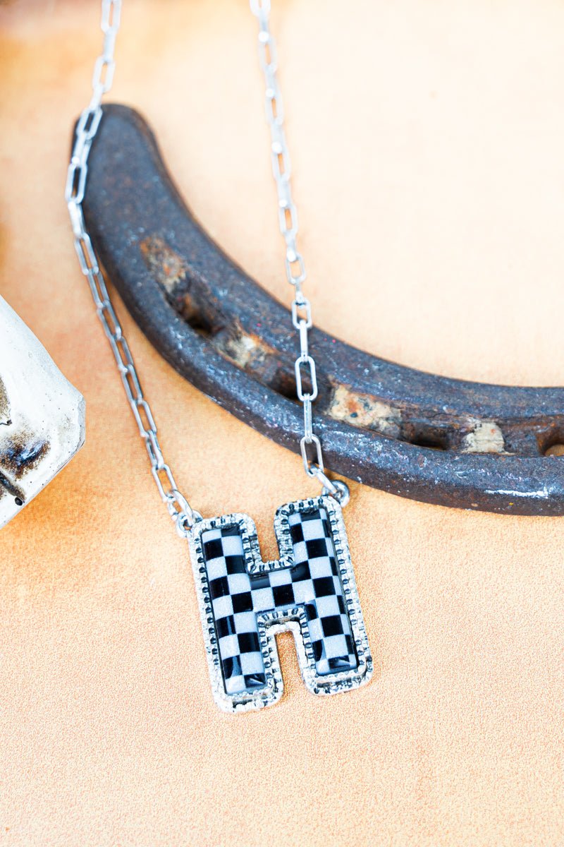 TIPI Black & White Checkered 'H' Silvertone Necklace - Wholesale Accessory Market