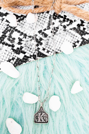 TIPI Cattle Tag 'K' Silvertone Necklace - Wholesale Accessory Market