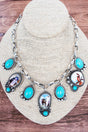 TIPI Turquoise Frontier Legend Silvertone Charm Necklace - Wholesale Accessory Market
