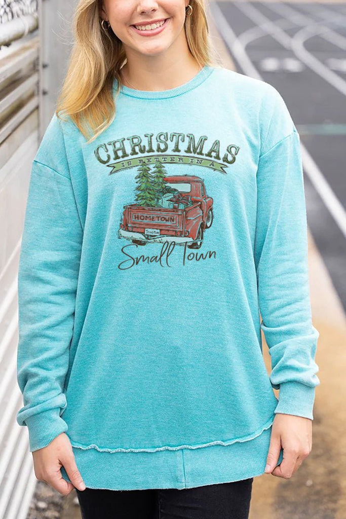 https://www.wholesaleaccessorymarket.com/products/christmas-better-in-a-small-town-cozy-for-days-turquoise-sweatshirt